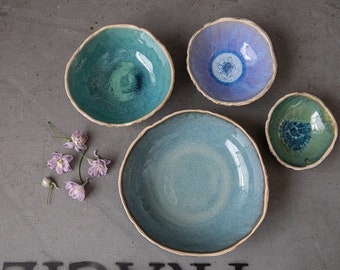 SET of four nesting bowls Unique handmade ceramic bowls with Organic look and feeling