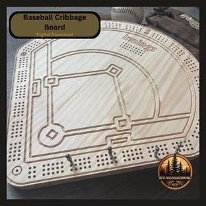 May include: A wooden baseball cribbage board featuring a baseball field design. The board has engraved lines and peg holes, with the word "Innings" etched into the wood. Includes a baseball, glove, and the text "Baseball Cribbage Board Digital Download".