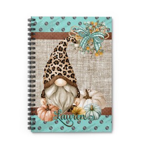 May include: A spiral bound notebook with a teal and white polka dot background. A brown burlap background with a leopard print gnome holding pumpkins. The text "Lauren" is written in a brown font.