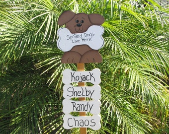 Personalized spoiled dogs live here garden stake