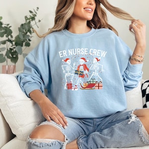 ER Nurse Crew Christmas Shirt, Funny Skeleton Nurse Sweatshirt, Holiday Gift for Emergency Room Nurses, Festive Xmas Party Outfit