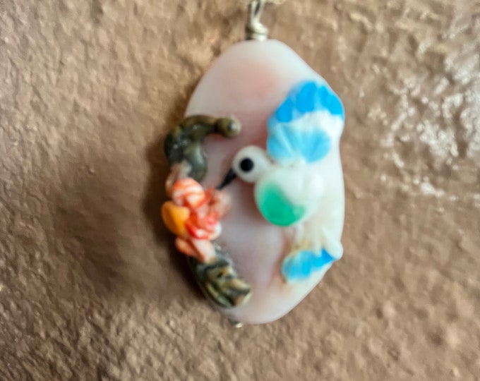 Think spring hummingbird pendant
