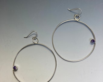 Large hoop earrings with amethyst