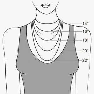 May include: Illustration of a person wearing a tank top with a necklace length guide. The guide shows necklace lengths of 35.5 cm, 40.6 cm, 45.7 cm, 50.8 cm, and 55.9 cm to help determine the best necklace length.