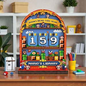 May include: A wooden Mario's Library book counter with the text "BOOKS READ THIS YEAR" and "MARIO'S LIBRARY". The counter displays the number 159. The design features pixelated characters and elements from the Super Mario video game series.