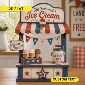 Puede incluir: Un puesto de helados decorativo de madera con un esquema de color rojo, blanco y azul. El puesto presenta el texto "Old Fashioned Ice Cream" y "Summer Treats". Tres conos de helado se exhiben en una caja de madera.