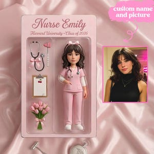 May include: A custom action figure in pink packaging labelled Nurse Emily, Harvard University, Class of 2026. The set includes a doll in pink scrubs, a stethoscope, a reflex hammer, a clipboard with a cherry icon, and a bouquet of pink tulips.