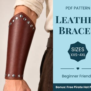 May include: A brown leather bracer featuring silver-toned metal studs along the top and bottom edges. The text on the right reads: PDF PATTERN LEATHER BRACER SIZES XXS-4XL Beginner Friendly Bonus: Free Pirate Hat Pattern.