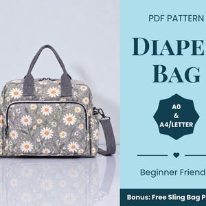 Può includere: Una borsa per pannolini grigia con motivo floreale a margherite bianche, dotata di due manici superiori, una tracolla rimovibile e una tasca frontale con cerniera. Il testo recita PDF PATTERN DIAPER BAG, A0 & A4/LETTER, Beginner Friendly, Bonus: Free Sling Bag Pattern.