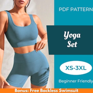 以下が含まれることがあります： ティール色のヨガセット。リブ編みのクロップトップとマッチするショーツが含まれています。画像には「Yoga Set」、「XS-3XL」、「Beginner Friendly」の文字があります。このセットは、ワークアウト中の快適さと柔軟性のために設計されています。