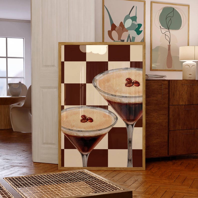 May include: Two brown and white coffee cocktails with coffee beans on top, set against a brown and white checkered background.