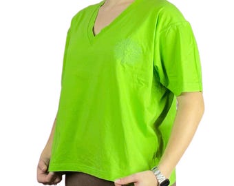 May include: A bright green short-sleeved v-neck t-shirt with a white design on the front.