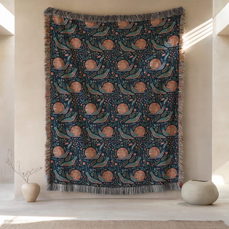 Tapestry with a repeating pattern of stylized snails and flowers.