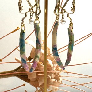 Abstract Face Dangle with pearl accent and colorful horn drop earrings
