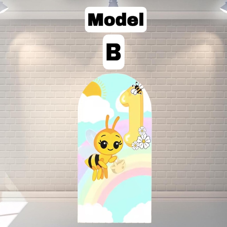 May include: A colorful birthday party decoration featuring a cartoon bee holding a basket, a yellow number one, and a rainbow. The words "Model B" are at the top. The background includes a sun, clouds, and daisies.