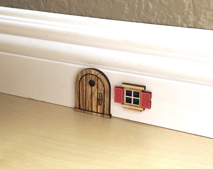 Miniature window with open shutters for Cute Lil' Mouse Doors or Fairy Doors. Available in several colors.