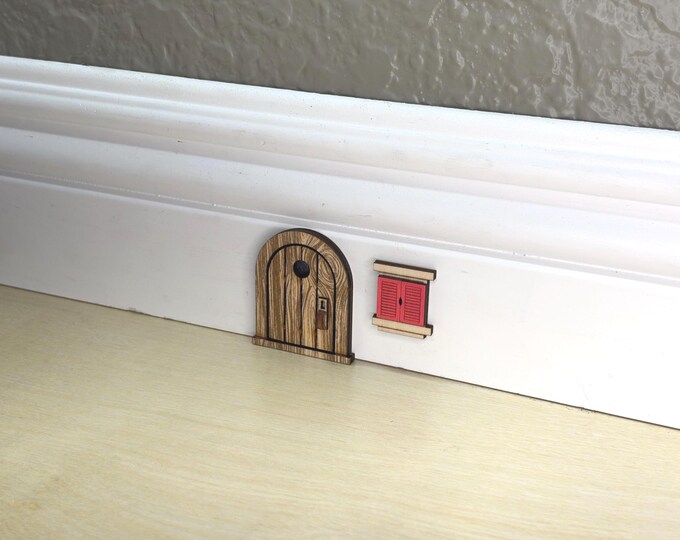 Miniature window with closed shutters for Cute Lil' Mouse Doors or Fairy Doors. Available in several colors.