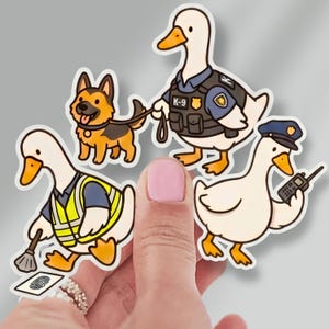 May include: Three die-cut stickers featuring cartoon ducks in law enforcement roles. One duck wears a K-9 vest and holds a leash for a German Shepherd. Another duck wears a high-visibility vest and examines a fingerprint. A third duck wears a police cap.