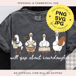 May include: Dark gray long-sleeve shirt featuring a whimsical illustration of four geese involved in sourdough baking. The geese are depicted with various baking tools and ingredients, with the text "will yap about sourdough" below.