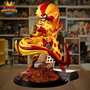 May include: A detailed figurine of a character with a fiery design, featuring red and yellow hues. The figure stands on a base with a textured, rocky appearance. The logo "LEGION MINIATURES 3D PRINTING DESIGNS" is visible.