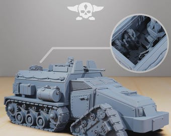 May include: A gray, tracked vehicle with a detailed design, featuring a driver and interior figures. The text "STATIONFORGE" is at the top, with a skull and wings emblem. The vehicle has a complex, angular structure.