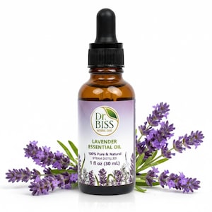 May include: A brown glass bottle of Dr. Biss Lavender Essential Oil with a black dropper, surrounded by sprigs of purple lavender flowers. The label reads "LAVENDER ESSENTIAL OIL" and "1 fl oz (30 ml)".