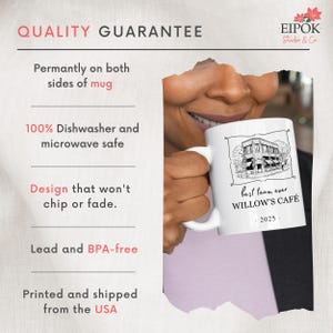 May include: White ceramic mug featuring a black and white illustration of a building with the text "best team ever WILLOW'S CAF&Eacute; - 2025." The mug is held by a person. The image also includes the text "QUALITY GUARANTEE".