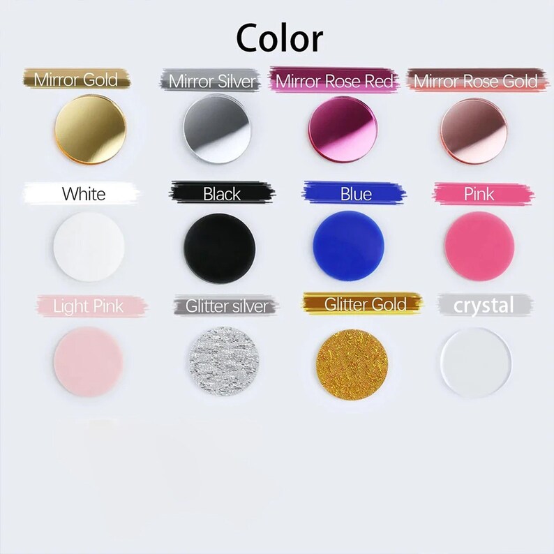 Pu&ograve; includere: Una tabella colori con oggetti rotondi in vari colori e finiture. I colori includono oro specchio, argento specchio, rosa specchio, oro rosa specchio, bianco, nero, blu, rosa, rosa chiaro, argento glitterato, oro glitterato e cristallo.