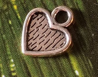 20 small textured heart charms (striped), silver tone, 11mm