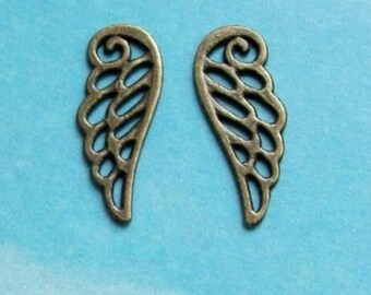 SALE - 10 wing outline charms, bronze tone, 24mm