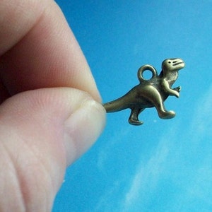 SALE, 10 bronze dinosaur charms, 23mm image 3