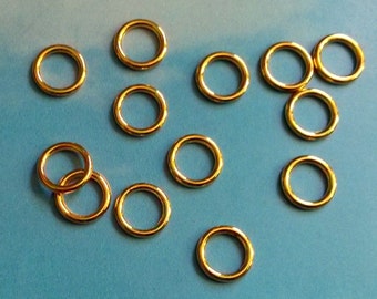 20 closed rings, shiny gold tone, 10mm