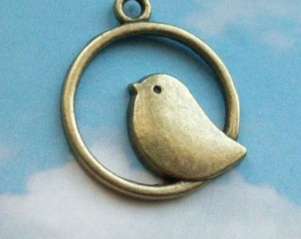 SALE - 10 sparrow in hoop pendants, bronze tone, 25mm