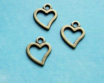 20 little asymmetrical heart outline charms, bronze tone, 10mm