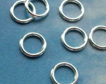 20 closed rings, silver tone, 10mm