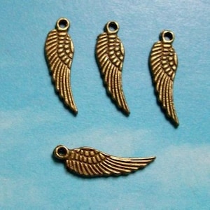 20 tiny wing charms, bronze tone, 17mm image 1