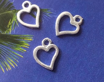 20 little asymmetrical heart outline charms, silver tone, 10mm