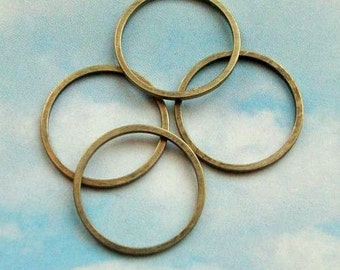 20 closed rings, antiqued bronze tone, 17mm