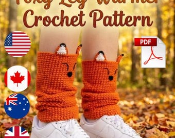 May include: Orange crochet leg warmers with fox faces, worn with white sneakers. The text "Foxy Leg Warmer Crochet Pattern" is at the top of the image. A PDF icon is in the upper right corner. Flags of the USA, Canada, Australia, and the UK are on the left.