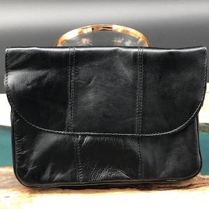 Women&#39;s Lambskin Leather Crossbody bag.