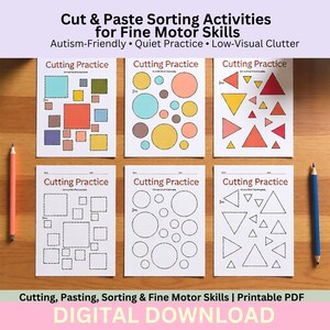 May include: Six white sheets with "Cutting Practice" text, featuring shapes for cutting and pasting. The sheets include squares, circles, and triangles in various colors and outlines. Two pencils, one orange and one blue, are on either side of the sheets. The text "Cut & Paste Sorting Activities" is at the top.