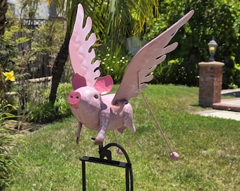Pink Flying Pig Garden Rocker: Steel Balancing Lawn Ornament