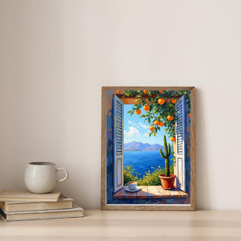 May include: A framed painting depicts a scenic view through a window. The artwork showcases a blue sea, mountains, and a cactus in a pot. Orange tree branches hang over the window, and a cup of coffee sits on the sill.