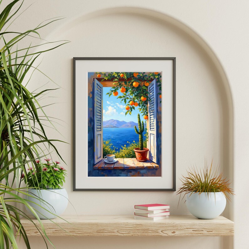 May include: A framed art print depicts a scenic view through a window. The artwork showcases a blue sea, mountains, and a cactus in a pot. Orange tree branches frame the window, and a cup and saucer sit on the sill.