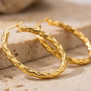 May include: A rustic wooden sign with the text "Welcome to our home" in white lettering. The sign has a distressed finish and a simple, inviting design, suitable for a front porch or entryway.