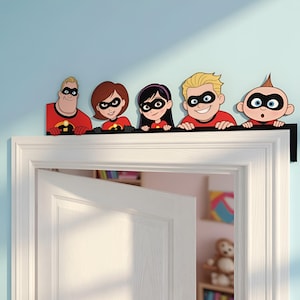 May include: A black door topper featuring the five members of The Incredibles family. Each character wears a red suit with a black mask and the yellow and orange logo on the chest. The figures are positioned in a row, peering over the top edge.
