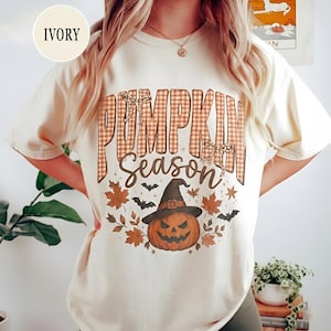 Maglietta a tema zucca, maglione autunnale con zucca, maglietta carina per Halloween, maglietta con zucca e fiocco, maglietta grafica per la stagione spettrale