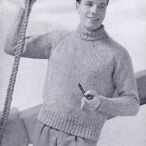 May include: A gray knitted sweater with a turtleneck collar. The sweater has a textured pattern and is worn by a person holding a pipe.
