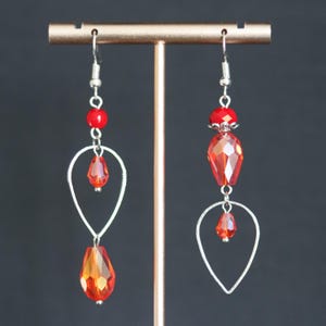 Red asymmetric dangle earrings, Long Red boho earrings, Silver and red mismatched statement earrings, Vibrant red drop earrings with hoops