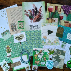 May include: A collection of assorted paper ephemera, including patterned scrapbook sheets, vintage book pages, decorative stickers, and die-cut illustrations featuring themes of nature, animals, wine, and the text Brave at heart and Thank You.
